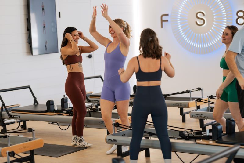 Participants at an FS8 class enjoying the workout